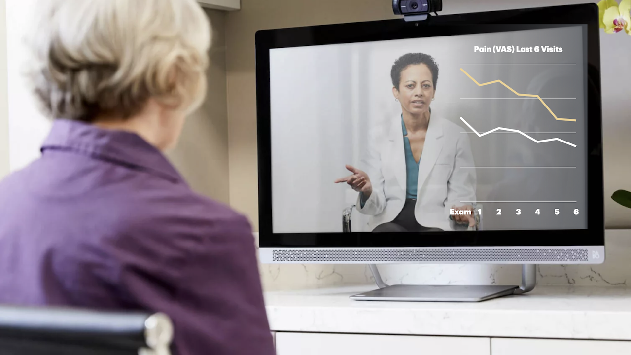 A screenshot of a telemedicine video call with an overlay of visual stimuli to increase engagement.